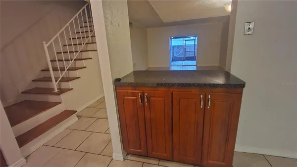 a view of entryway with stairs
