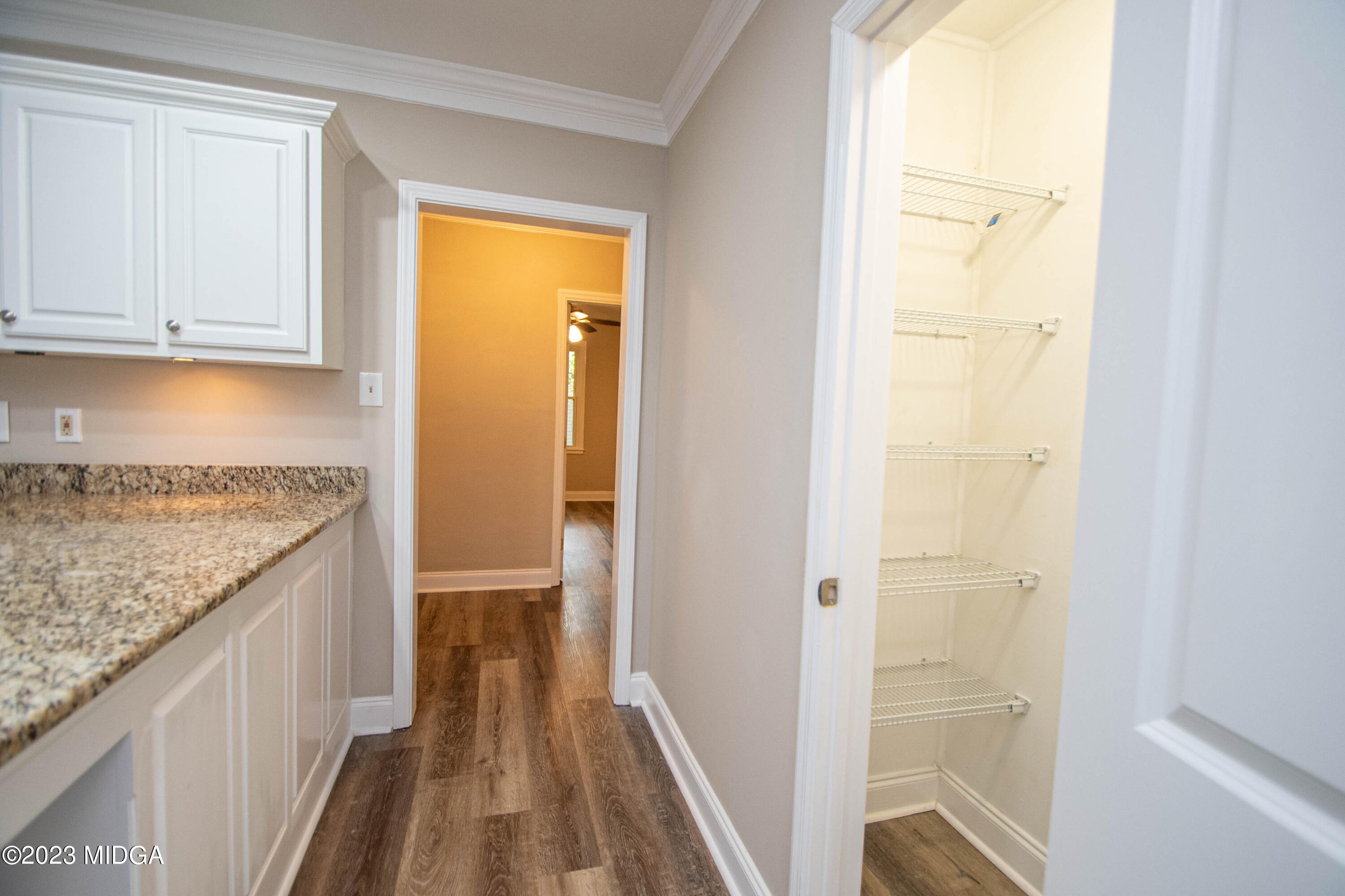 225 R Street Northwest Thomaston, GA 30286 - Photo 14 of 22 a view of a kitchen from the hallway