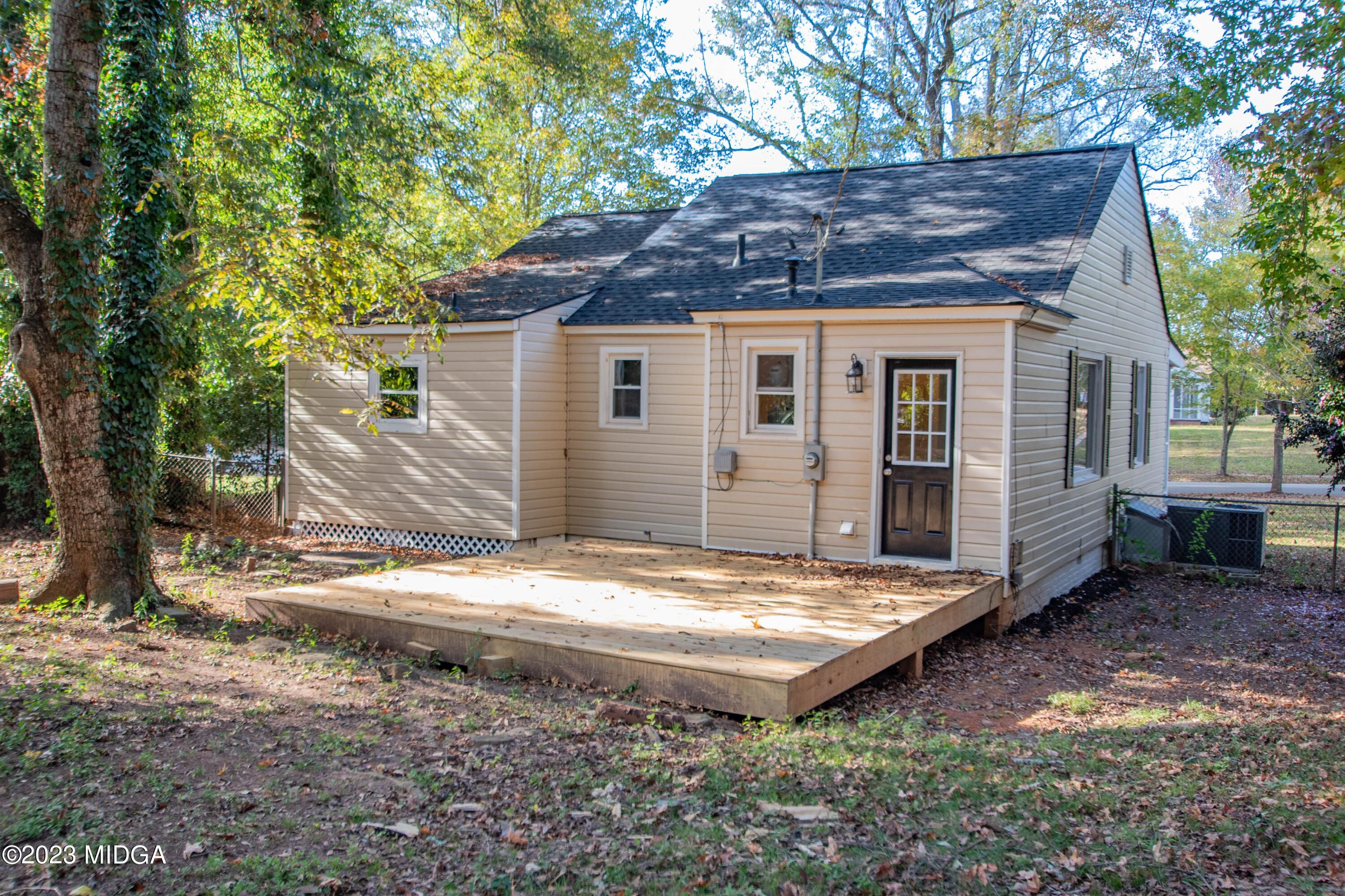 225 R Street Northwest Thomaston, GA 30286 - Photo 22 of 22 a view of house with backyard and seating area