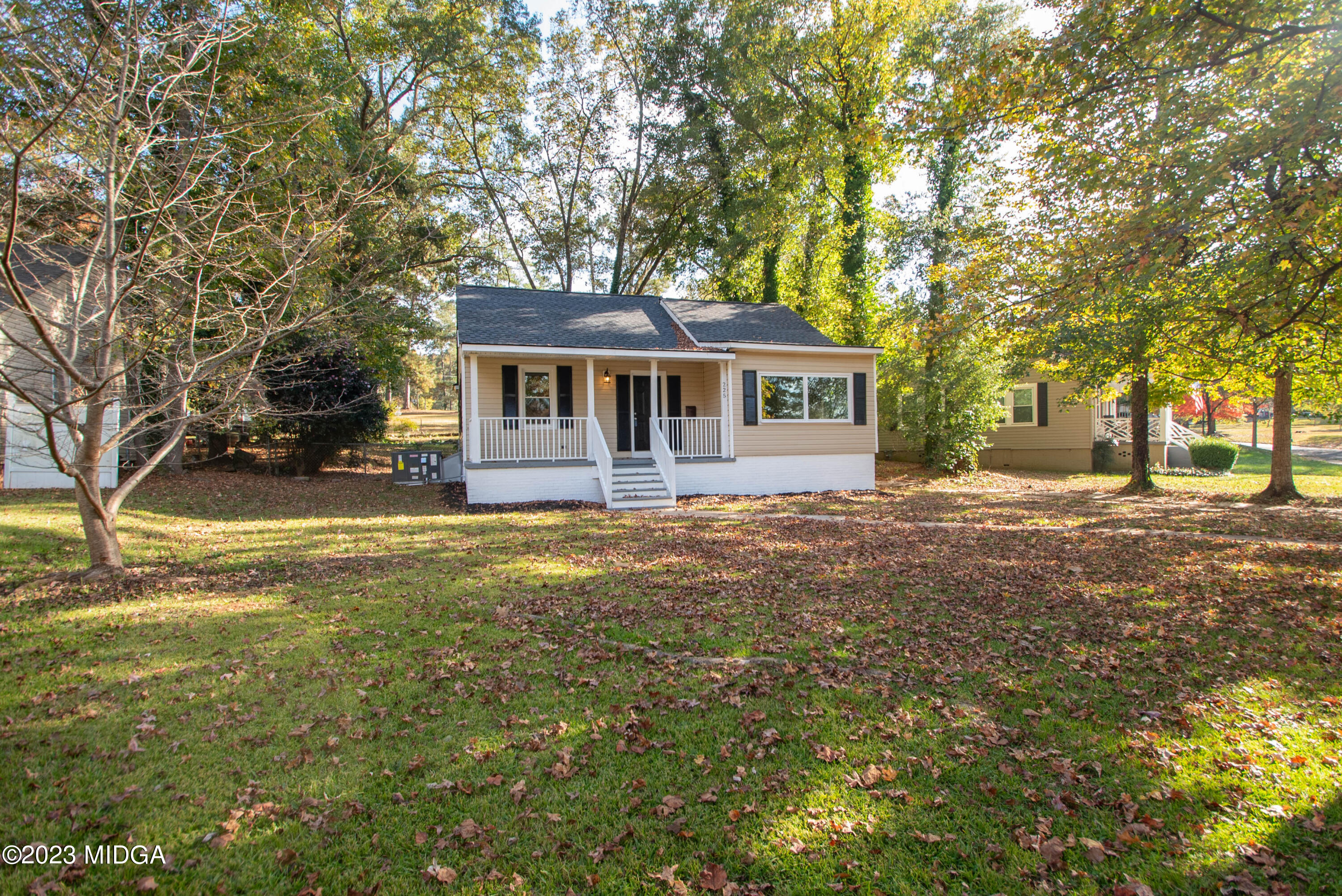 225 R Street Northwest Thomaston, GA 30286 - Photo 6 of 22 a front view of house with yard and trees