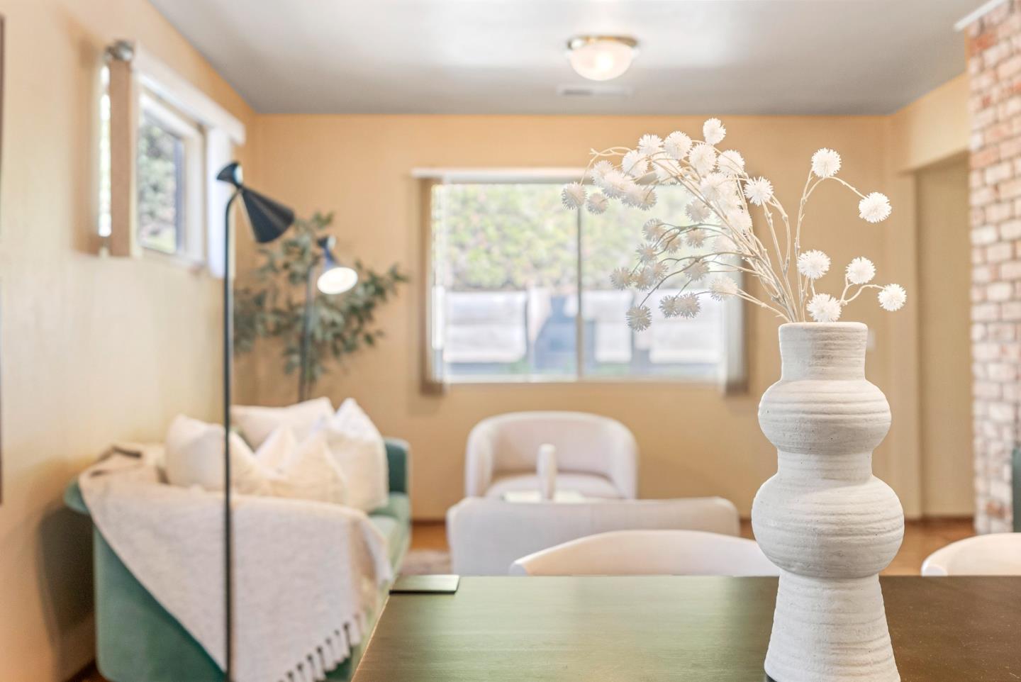1461 Vía Marettimo Monterey, CA 93940 - Photo 16 of 38 a living room with furniture and a large window