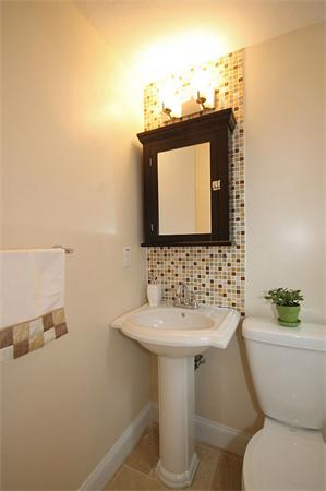 69 Stone Road Sudbury, MA 01776 - Photo 11 of 13 a bathroom with a sink and a toilet