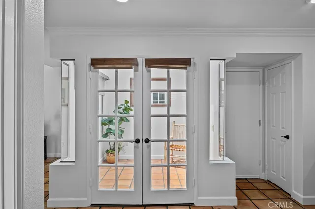 a view of front door with wooden floor