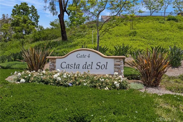 a sign on the side of the road