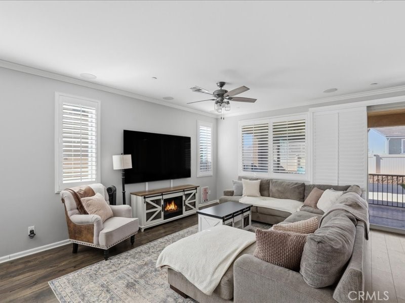 1569 Taurus Lane Beaumont, CA 92223 - Photo 12 of 33 a living room with furniture and a flat screen tv