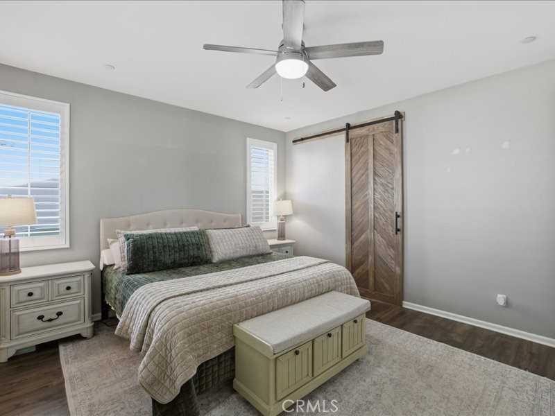 1569 Taurus Lane Beaumont, CA 92223 - Photo 22 of 33 a bedroom with a bed and a window