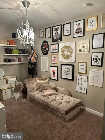 a bedroom with a bed and furniture