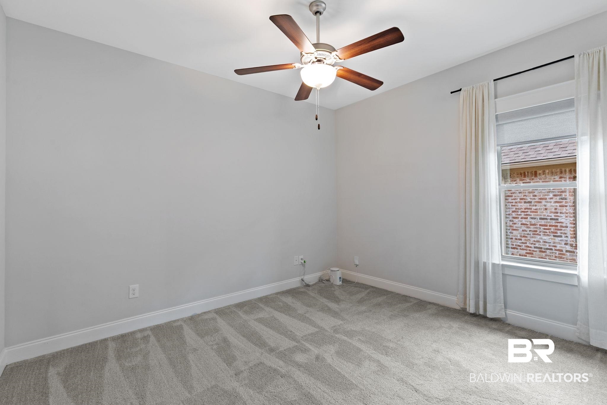 31654 Canopy Loop Daphne, AL 36527 - Photo 40 of 64 Spare room featuring ceiling fan and light colored carpet