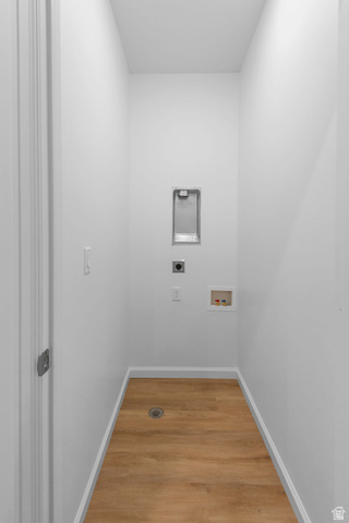 1302 East 1670th North, Unit 908 Payson, UT 84651 - Photo 19 of 21 Laundry area featuring hookup for a washing machine, light wood-style flooring, and hookup for an electric dryer