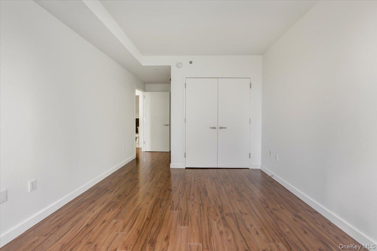 70 Fleet Street, Unit 19F Brooklyn, NY 11201 - Photo 15 of 32 a view of a room with wooden floor