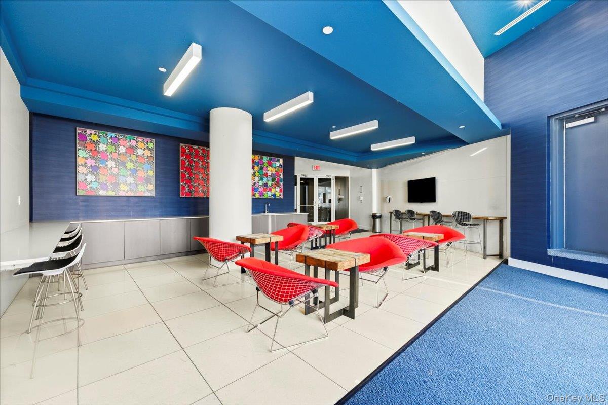 70 Fleet Street, Unit 19F Brooklyn, NY 11201 - Photo 21 of 32 a room with musical instruments and air hockey table