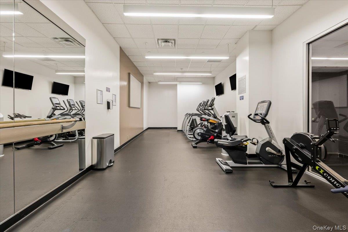 70 Fleet Street, Unit 19F Brooklyn, NY 11201 - Photo 24 of 32 a view of a room with gym equipment