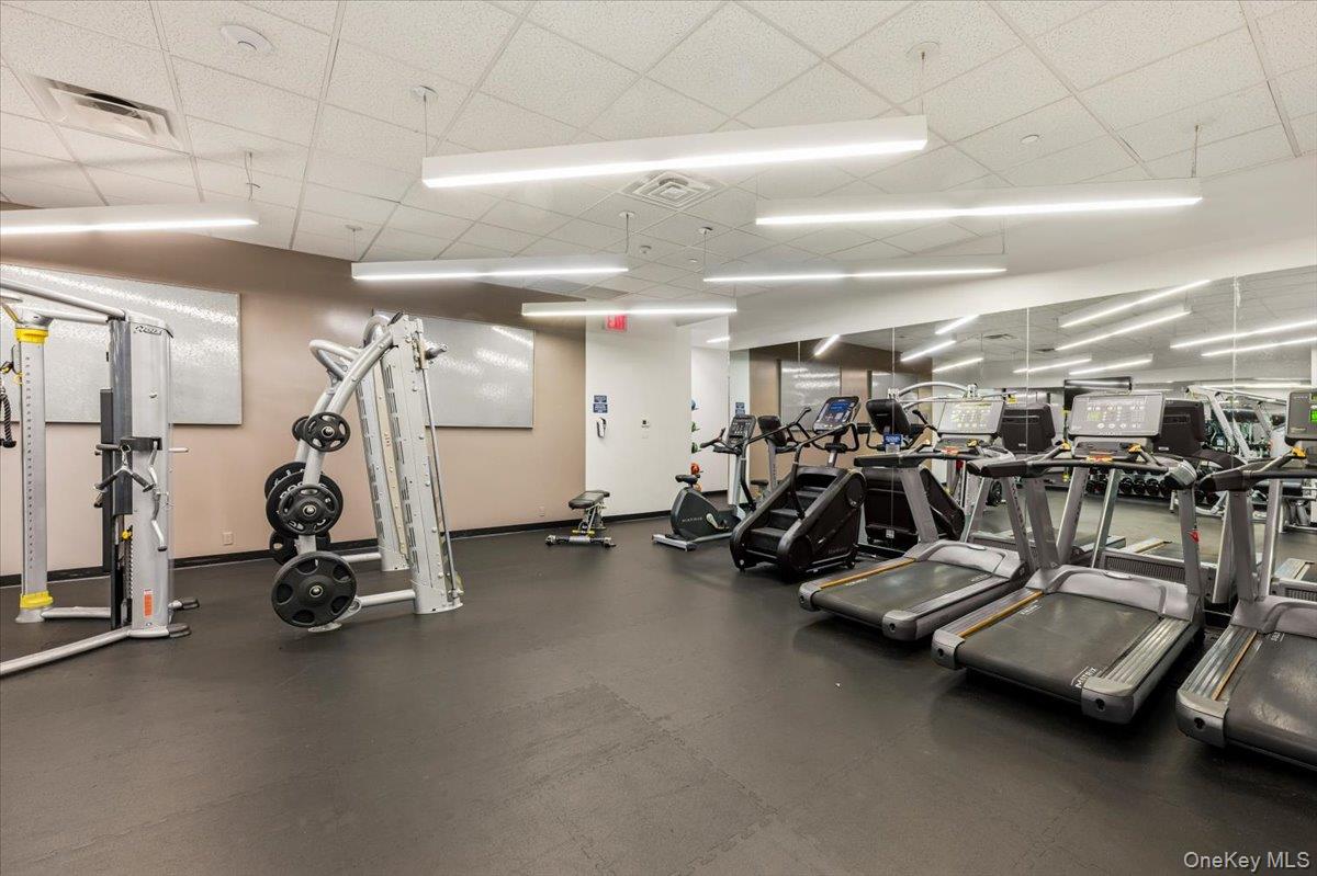 70 Fleet Street, Unit 19F Brooklyn, NY 11201 - Photo 25 of 32 a view of a room with gym equipment
