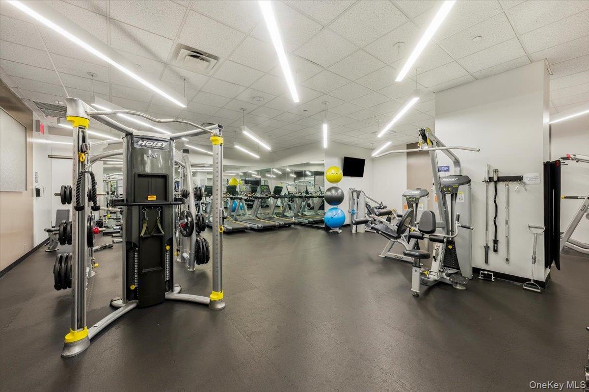 70 Fleet Street, Unit 19F Brooklyn, NY 11201 - Photo 26 of 32 a view of a room with gym equipment