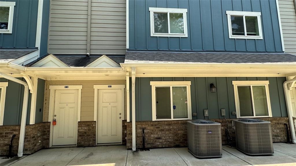 21155 Gosling Road, Unit 38C Spring, TX 77388 - Photo 3 of 21 a view of a car park in front of house