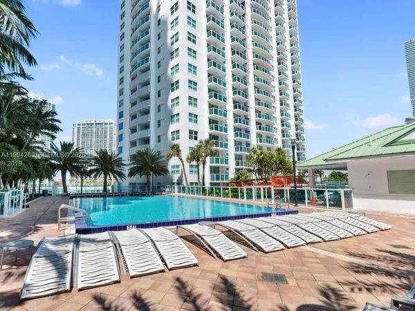 a view of a patio with a yard