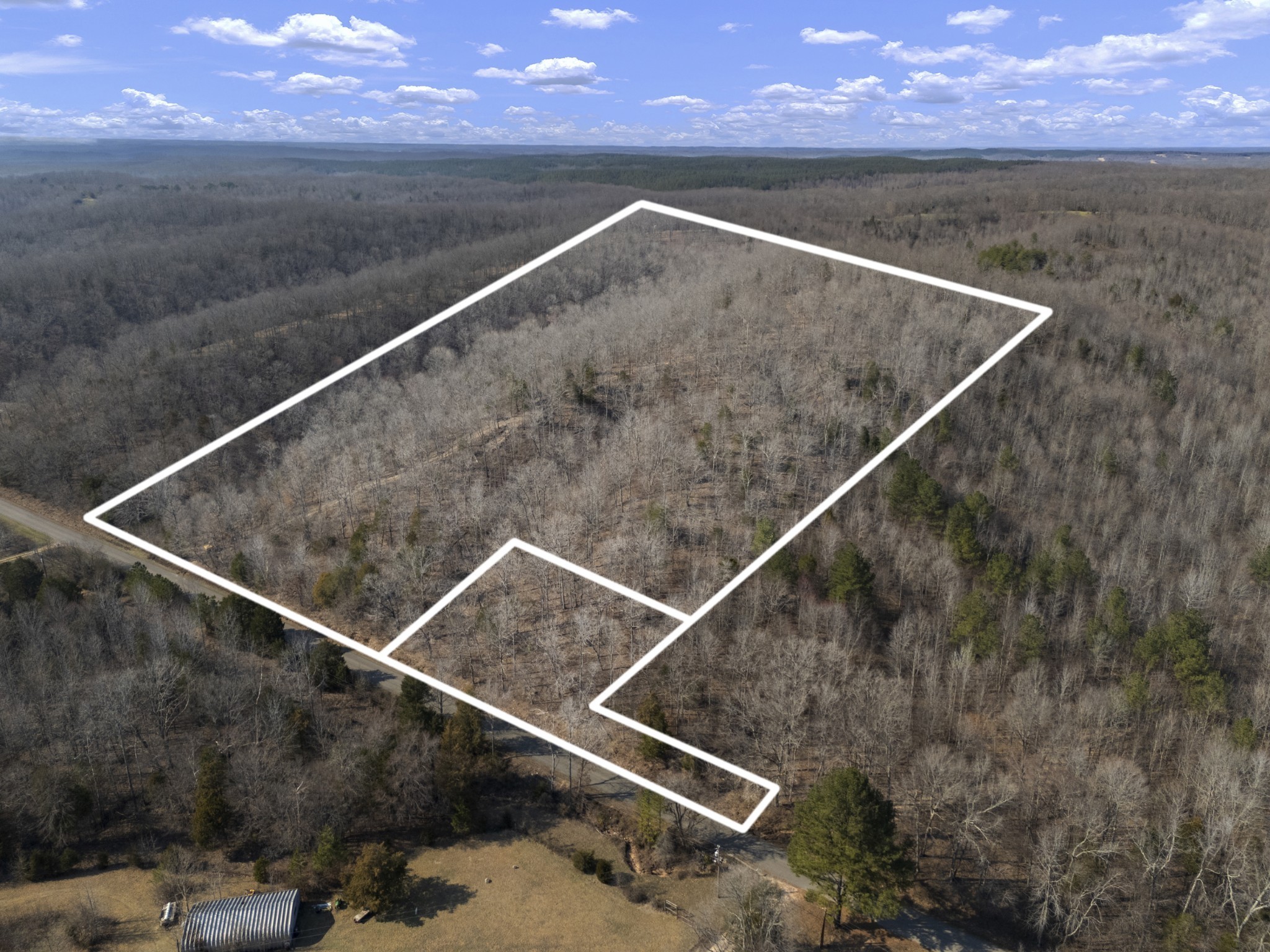 3900 Roan Creek Road Lobelville, TN 37097 - Photo 28 of 38 a view of a tennis court