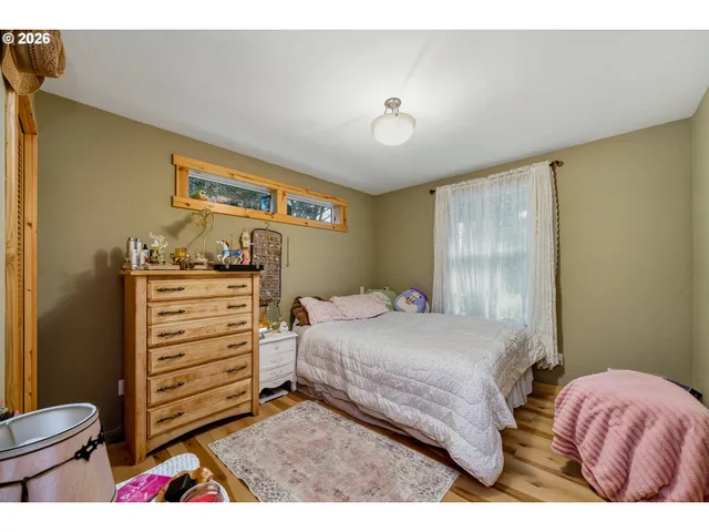 a view of front door of house and tree