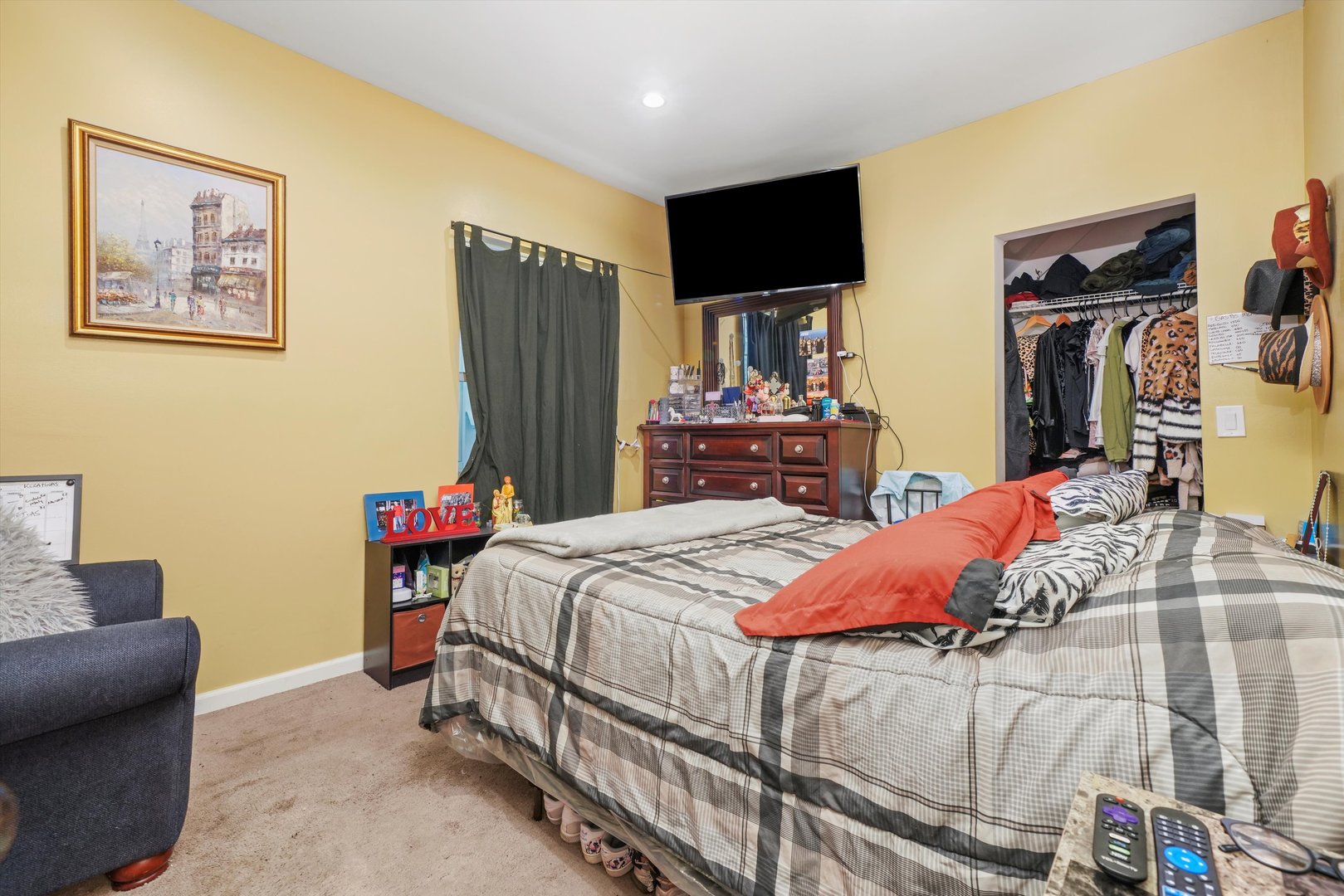 Undisclosed Address Chicago, IL 60641 - Photo 11 of 32 a bedroom with a bed and wooden floor