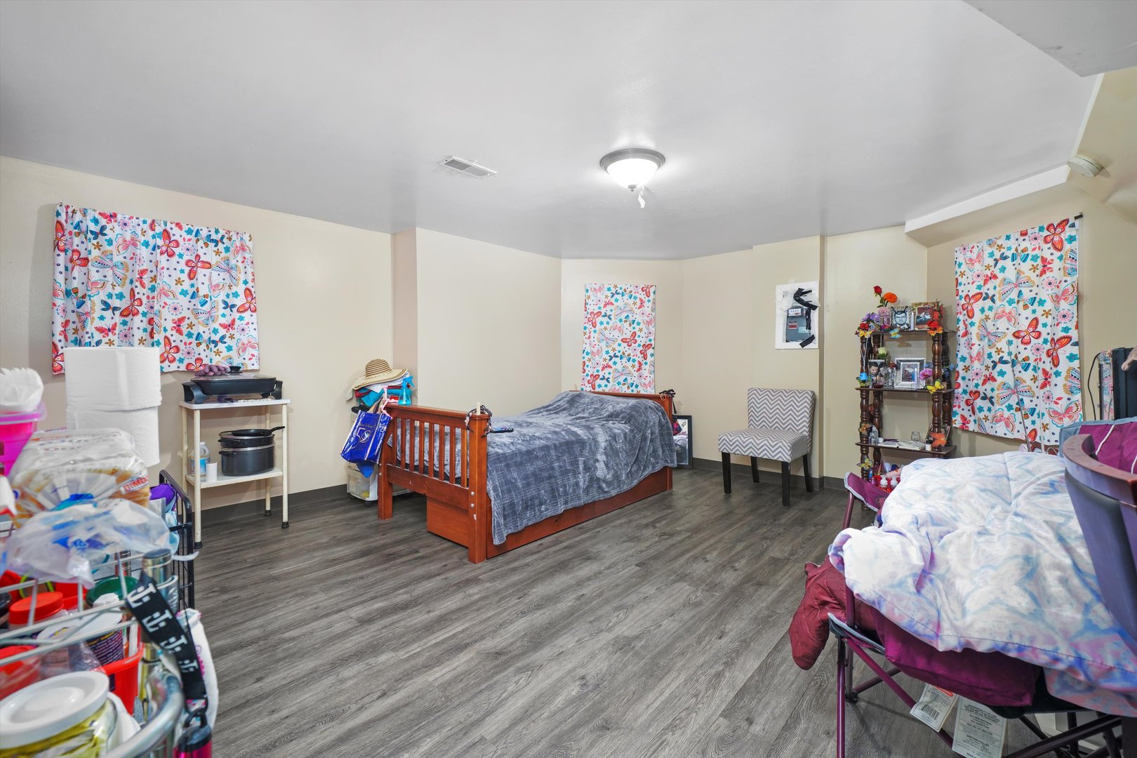 Undisclosed Address Chicago, IL 60641 - Photo 15 of 32 a bedroom with furniture and a chair