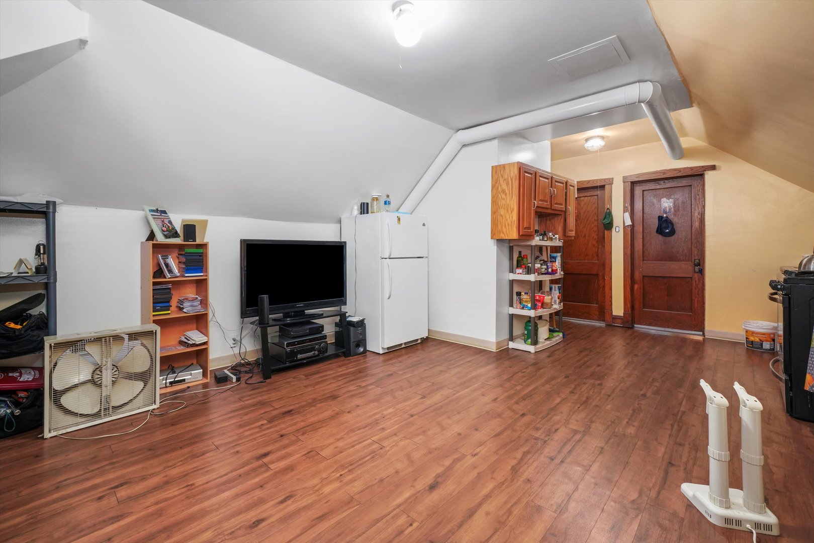 Undisclosed Address Chicago, IL 60641 - Photo 22 of 32 a view of a livingroom with furniture and a flat screen tv