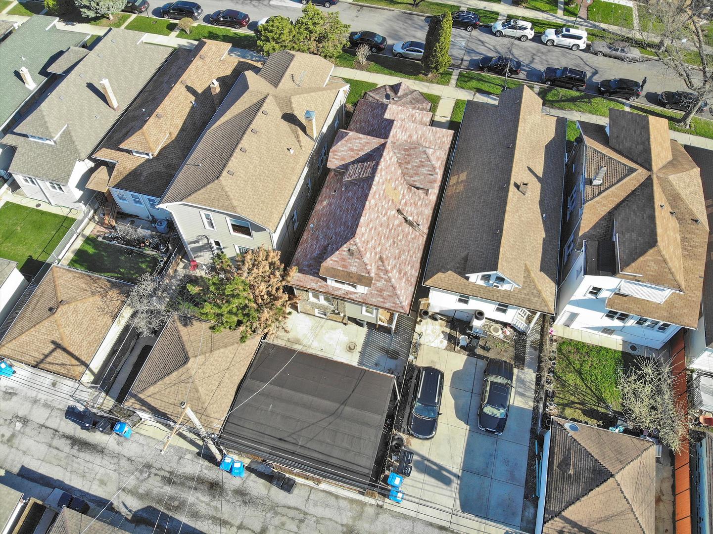 Undisclosed Address Chicago, IL 60641 - Photo 32 of 32 an aerial view of a house with a garden