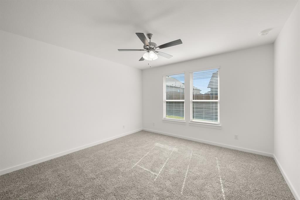 8709 Preakness Street Pilot Point, TX 76258 - Photo 11 of 24 20_6937 Freight Train- Primary Suite-1