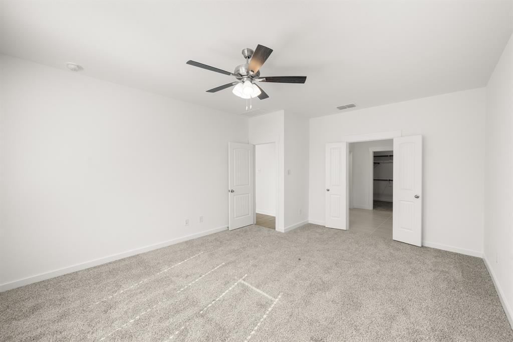 8709 Preakness Street Pilot Point, TX 76258 - Photo 12 of 24 21_6937 Freight Train- Primary Suite-2