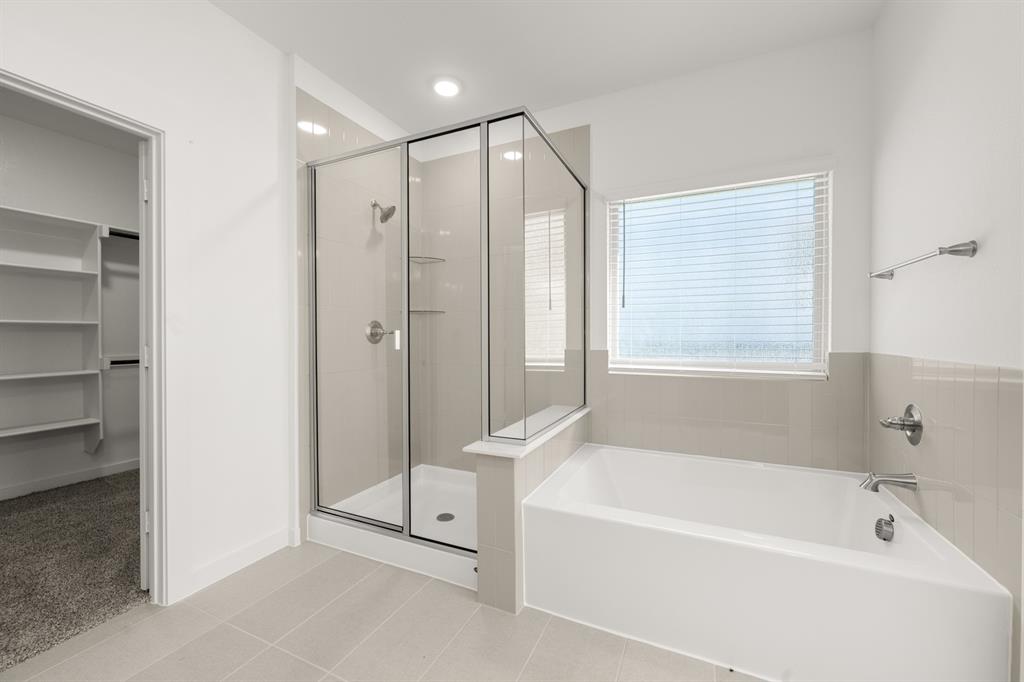 8709 Preakness Street Pilot Point, TX 76258 - Photo 15 of 24 24_6937 Freight Train- Primary Suite-5