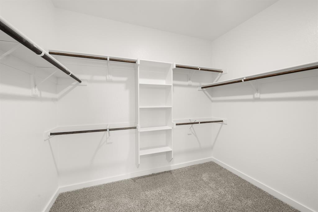 8709 Preakness Street Pilot Point, TX 76258 - Photo 16 of 24 25_6937 Freight Train- Primary Suite-6