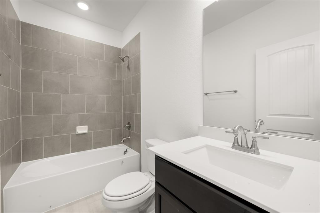 8709 Preakness Street Pilot Point, TX 76258 - Photo 17 of 24 8_6937 Freight Train- Bathroom-1