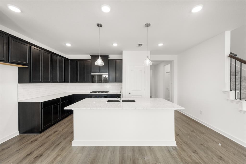 8709 Preakness Street Pilot Point, TX 76258 - Photo 5 of 24 14_6937 Freight Train- Kitchen-2