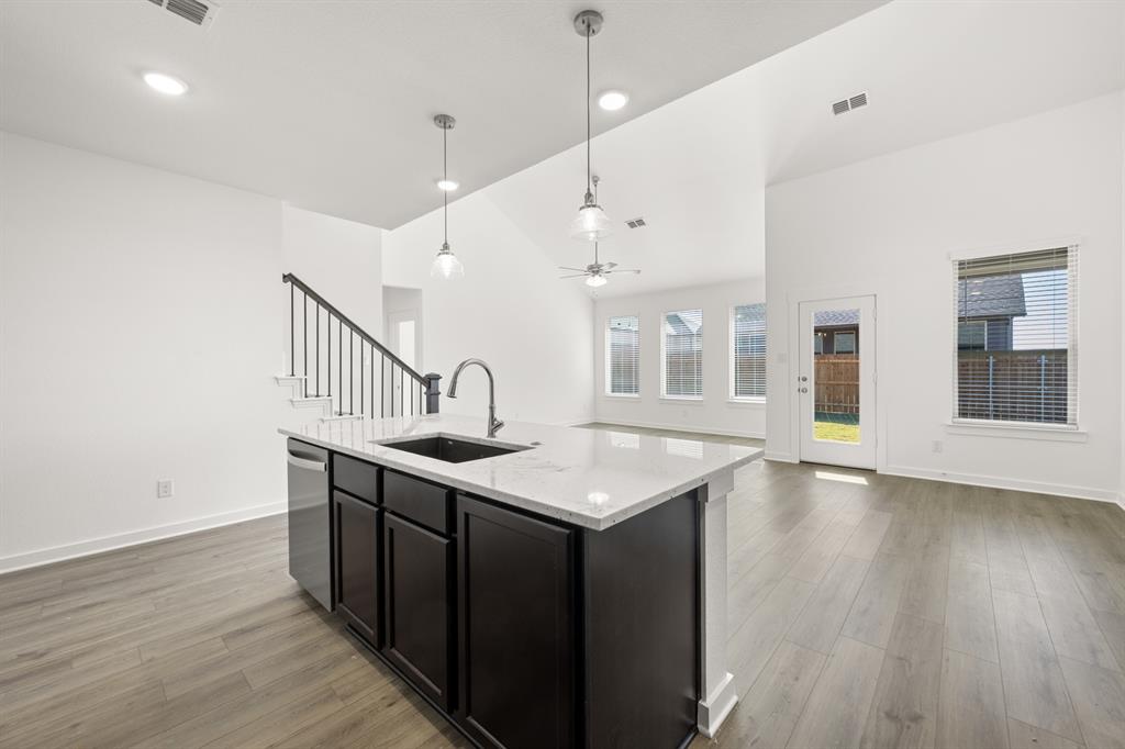 8709 Preakness Street Pilot Point, TX 76258 - Photo 7 of 24 16_6937 Freight Train- Kitchen-4