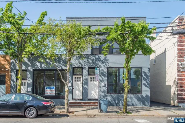 a car parked in front of a building