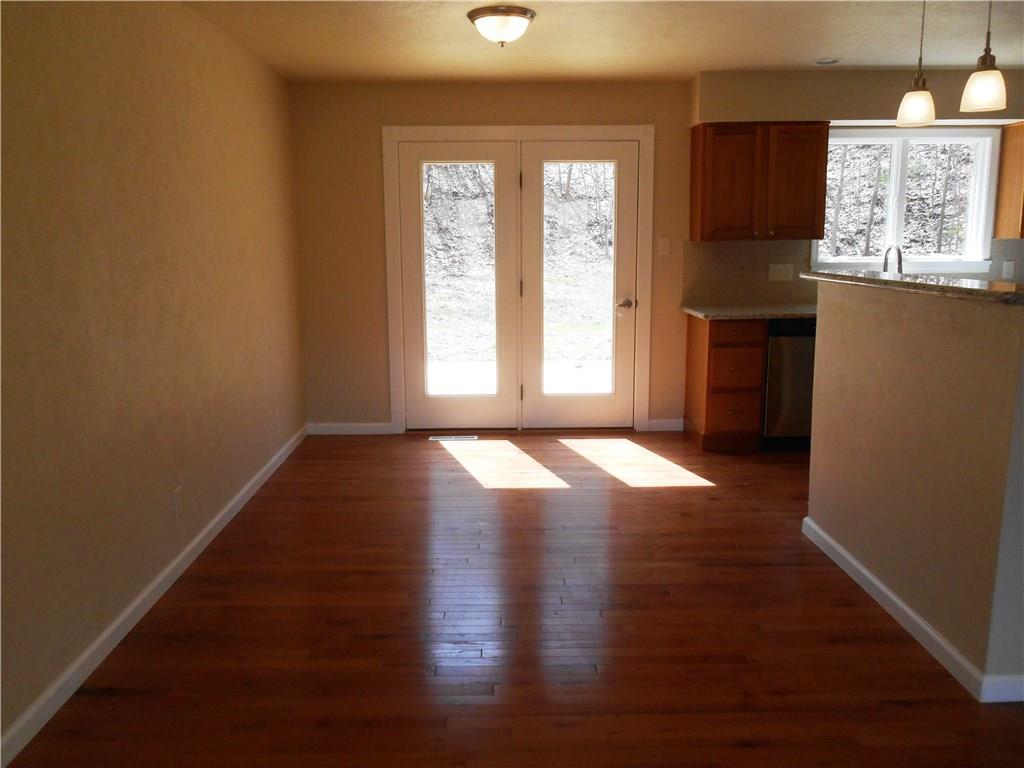 36 Simon Road Cheswick, PA 15024 - Photo 5 of 25 The French door leads out from the dining room onto the wrap around deck!