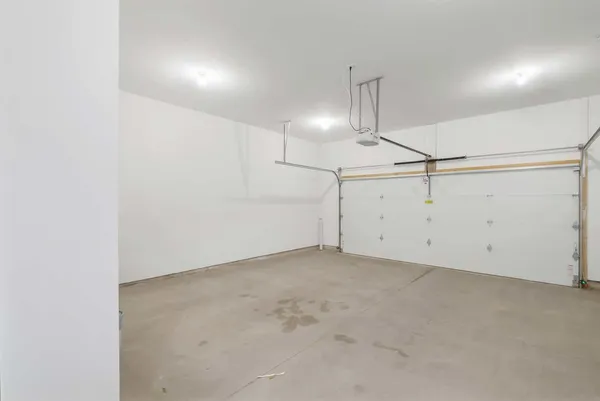 an empty room with ceiling fan