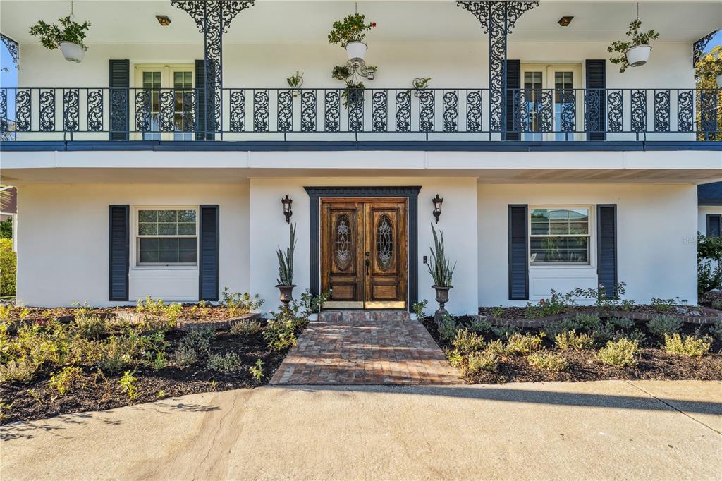 7621 Orange Tree Lane Orlando, FL 32819 - Photo 3 of 47 front view of a house