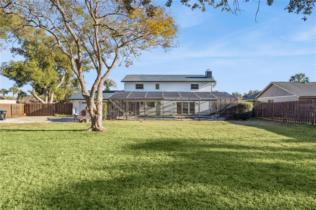 7621 Orange Tree Lane Orlando, FL 32819 - Photo 37 of 47 a house view with a outdoor space