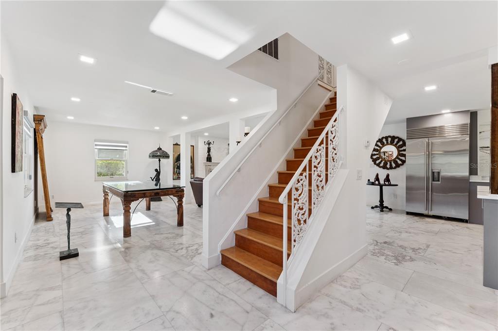 7621 Orange Tree Lane Orlando, FL 32819 - Photo 8 of 47 a view of entryway with stairs