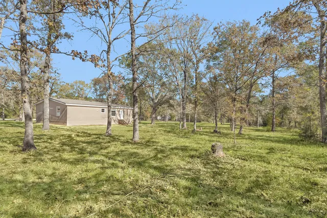 $199,000 | 32 East Lake Road, Huntsville, TX 77340