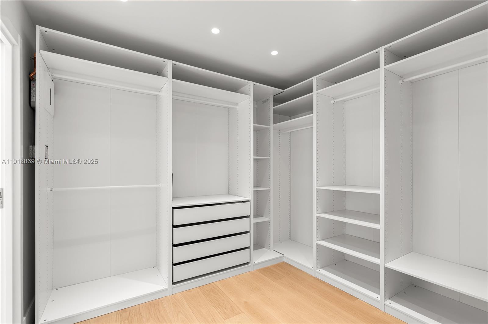 45 Northeast 104th Street Miami Shores, FL 33138 - Photo 27 of 52 a view of an empty walk in closet