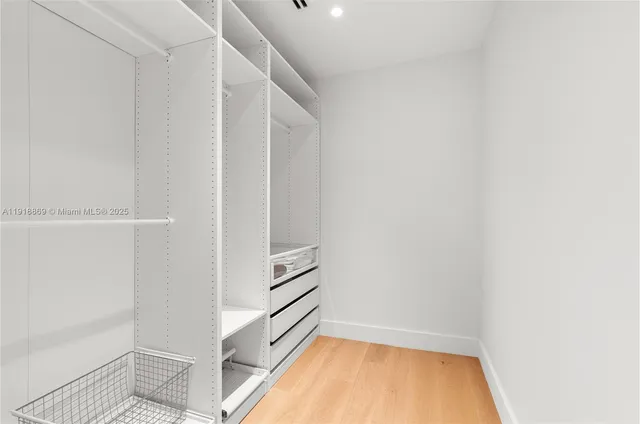 a en suite bathroom with a tub shower and toilet