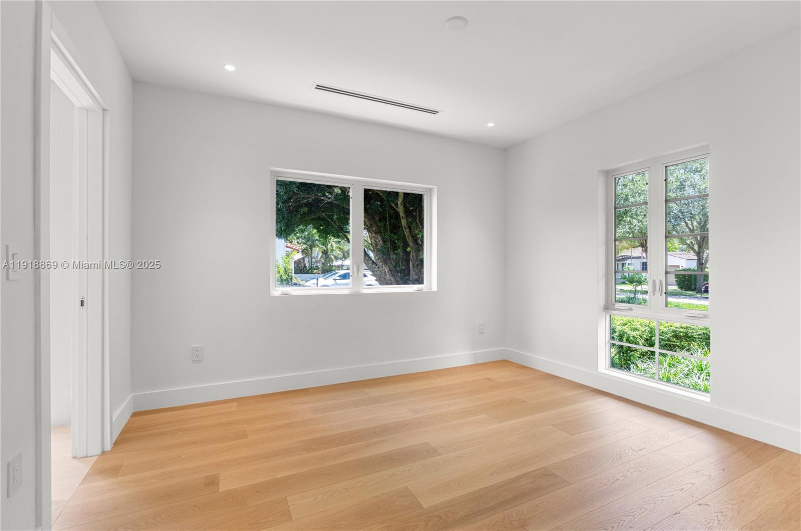 45 Northeast 104th Street Miami Shores, FL 33138 - Photo 40 of 52 an empty room with a window