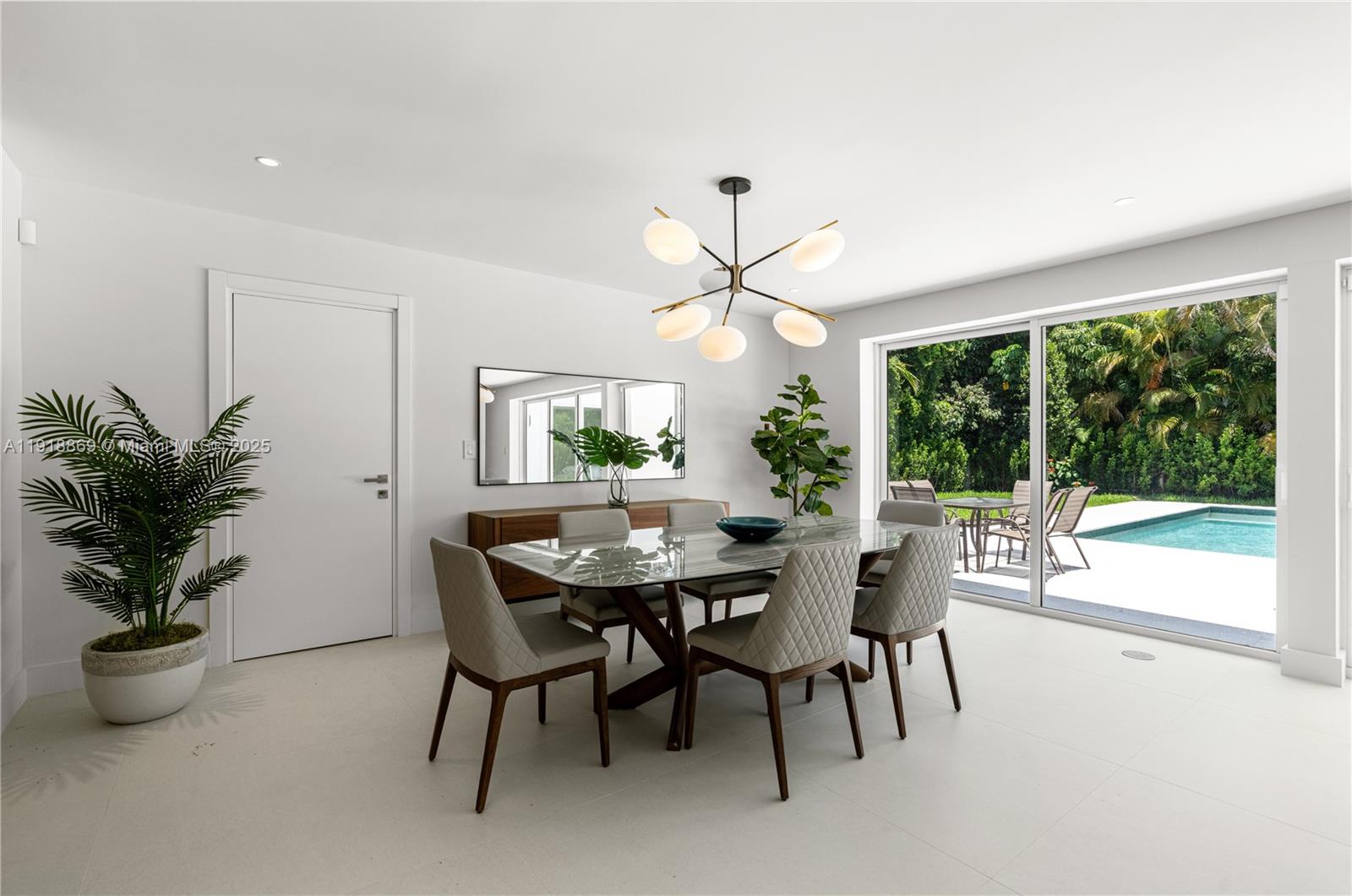 45 Northeast 104th Street Miami Shores, FL 33138 - Photo 42 of 52 a view of a dining room with furniture window and outside view