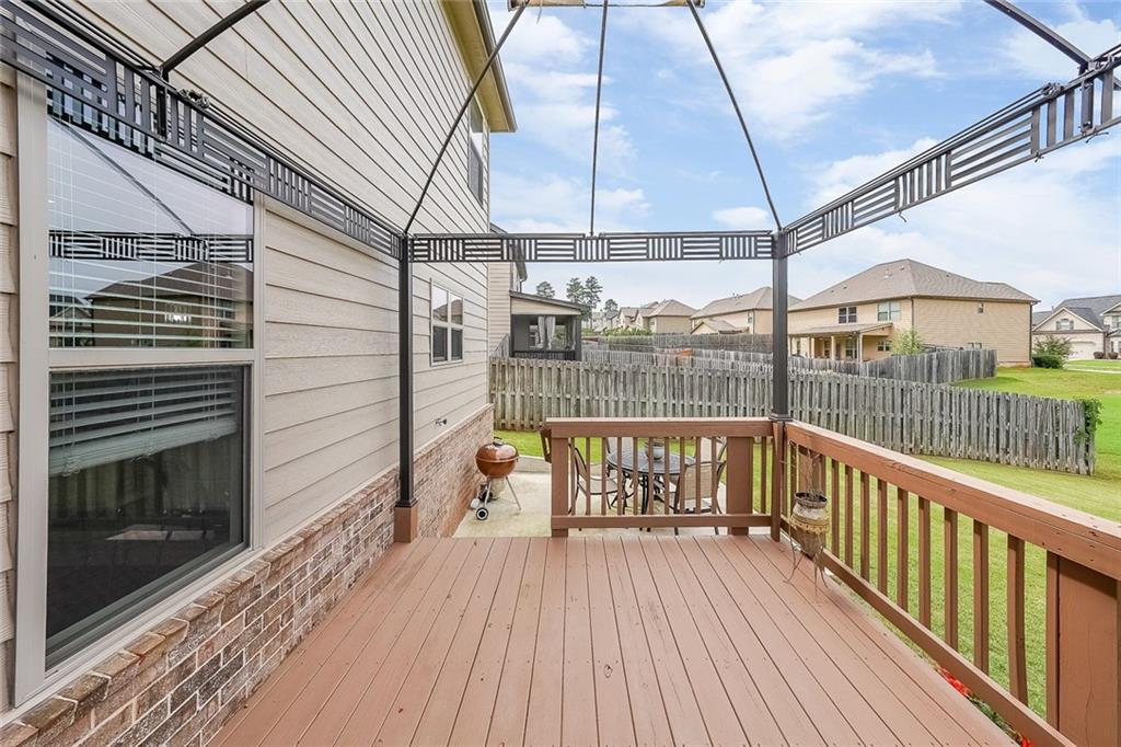 8097 White Oak Loop Lithonia, GA 30038 - Photo 3 of 25 a view of a balcony with wooden floor