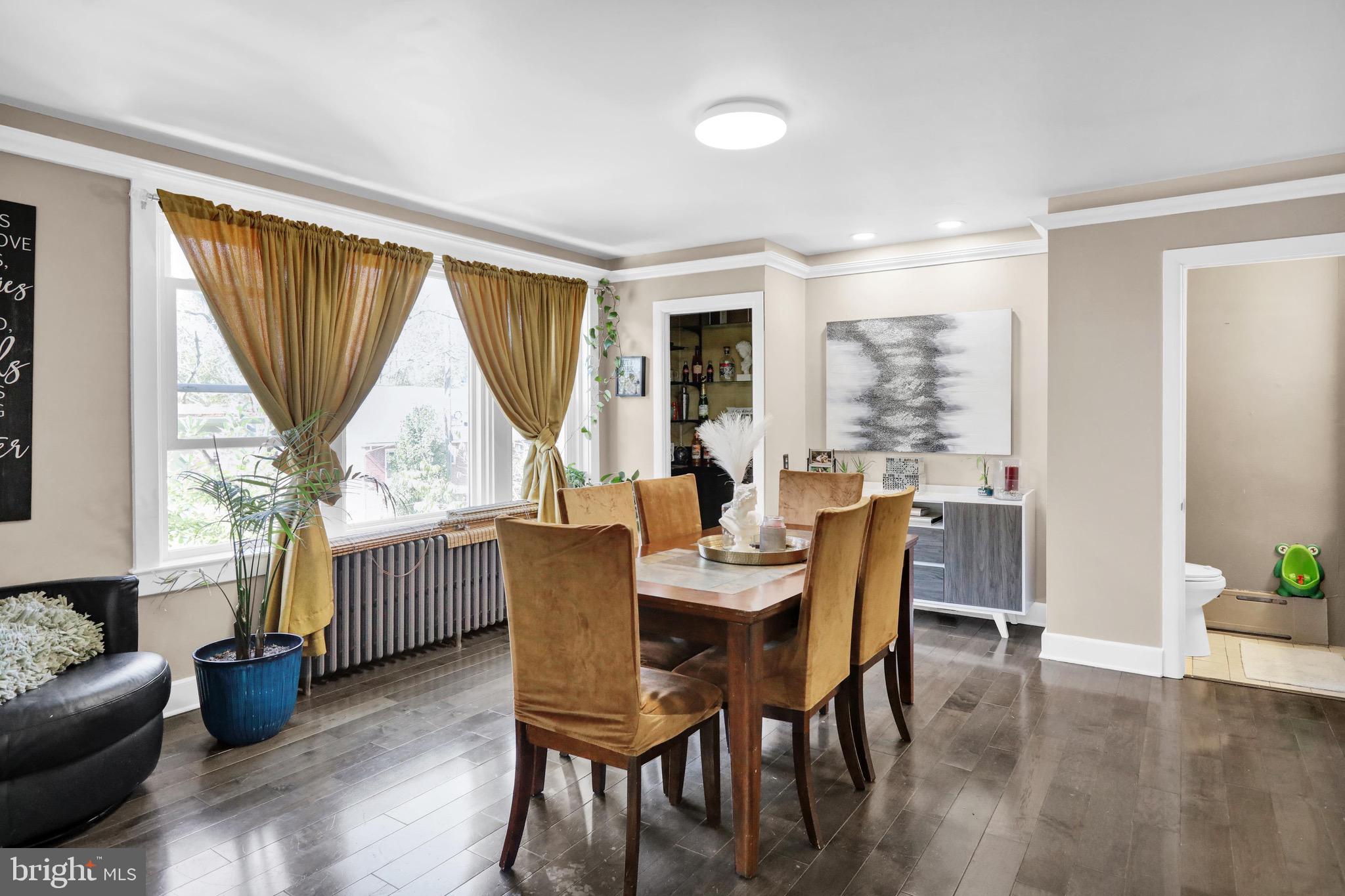 1511 Union Street Reading, PA 19604 - Photo 12 of 37 a dining room with furniture window and wooden floor
