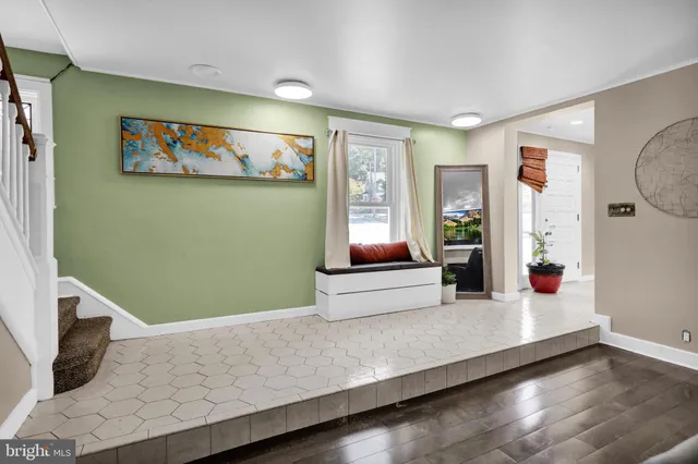 a living room with furniture and window