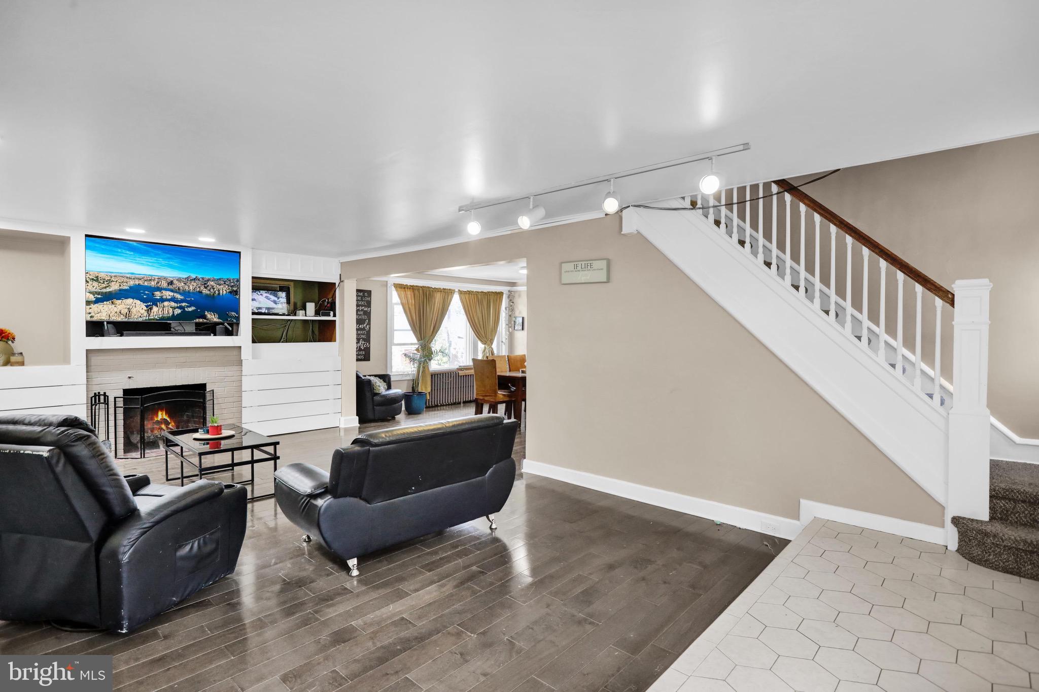 1511 Union Street Reading, PA 19604 - Photo 18 of 37 a living room with furniture and a fireplace
