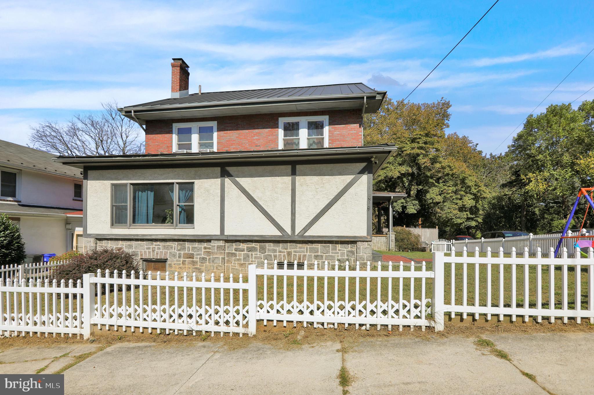 1511 Union Street Reading, PA 19604 - Photo 2 of 37 a front view of a house with a porch