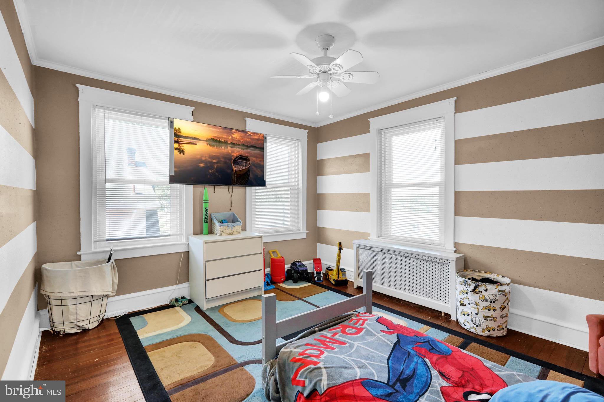 1511 Union Street Reading, PA 19604 - Photo 21 of 37 a living room with furniture and a flat screen tv